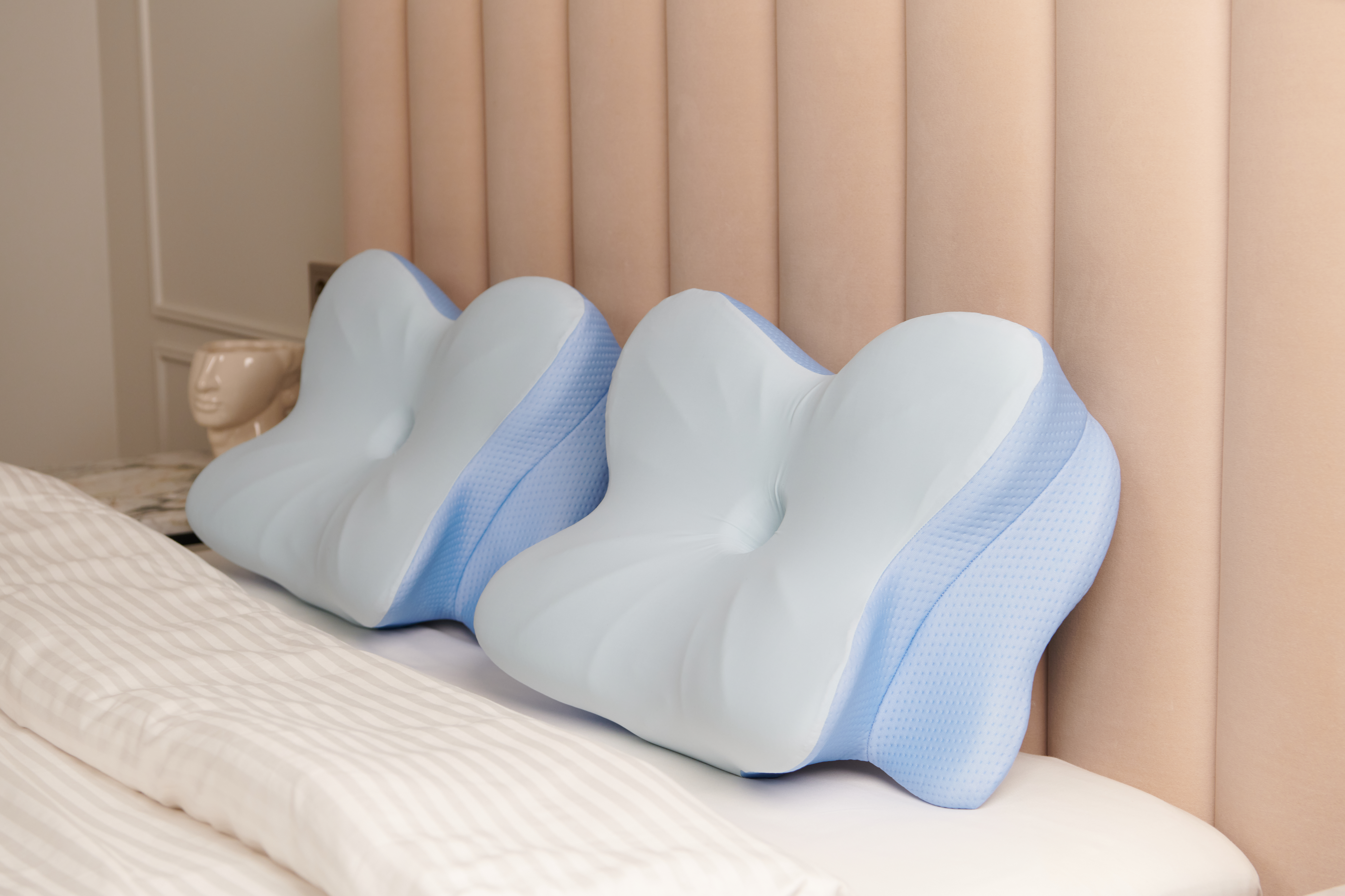Derila Ergo ergonomic pillows on a bed
